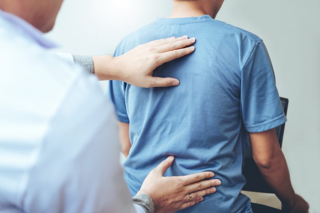 RADIO FREQUENCY ABLATION Doctor consulting with patient Back problems