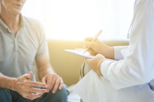 INTERVENTIONAL SPINE man speaks to doctor